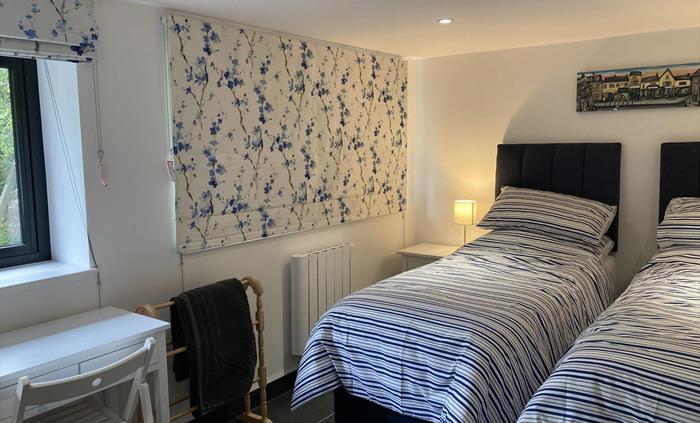 This room can be configured as a king size or twin beds.
